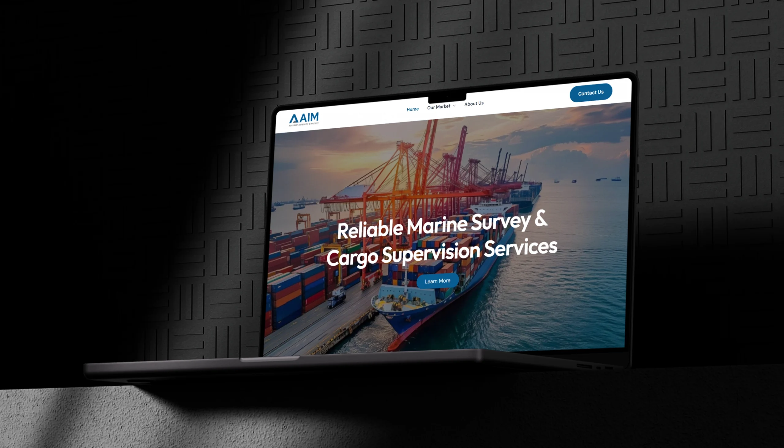 AIM IQS marine cargo inspection website displayed on a laptop screen